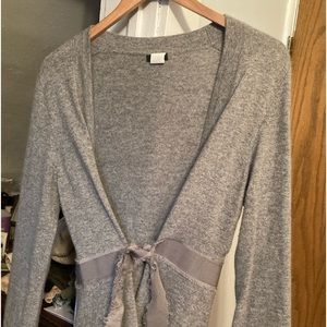 J Crew wrap sweater.  40% merino wool  30% viscose  20% angora  10% cashmere.